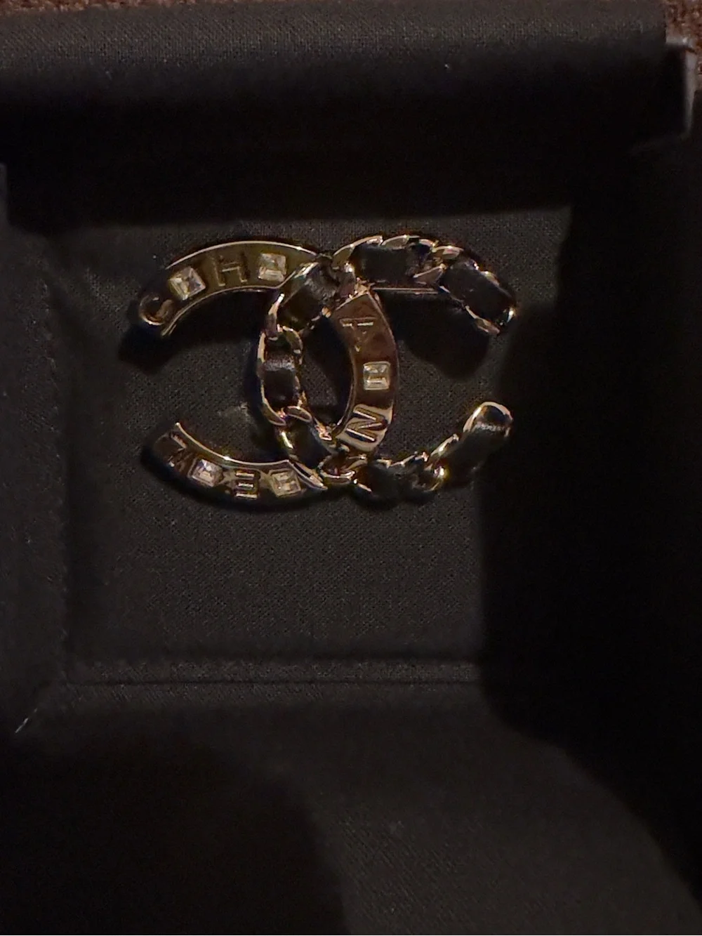 LIKE NEW CHANEL Gold and Black Interlocking CC Logo Brooch. 19S Collection.